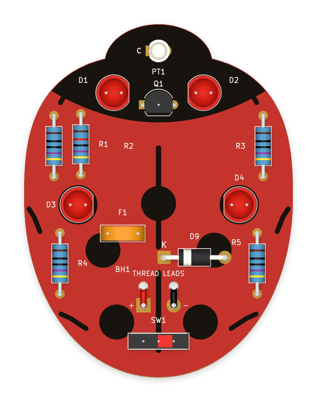 Assembled Ladybird with four red LEDs, banded resistors and a light sensor